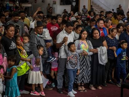 Mexican migrants, many from Michoacan state, attend a religious service at the Embajadores de Jesus Christian migrant shelter in Tijuana, Mexico, Sept. 26, 2023.