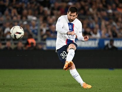PSG's forward Lionel Messi kicks the ball during the French L1 football match between RC Strasbourg Alsace and PSG at Stade de la Meinau in Strasbourg, France, on May 27, 2023.