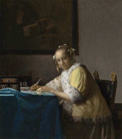 'Dama en amarillo escribiendo', Vermeer