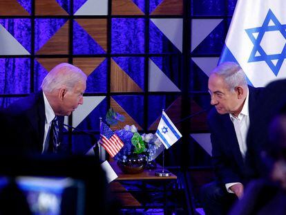 Joe Biden speaks with Israeli Prime Minister Benjamin Netanyahu in Tel Aviv on October 18.