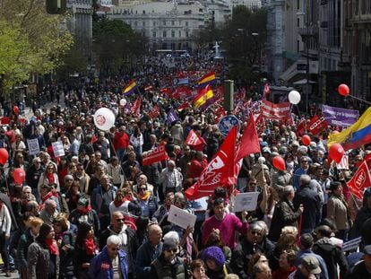 People march during the Labor Day rally in Madrid.