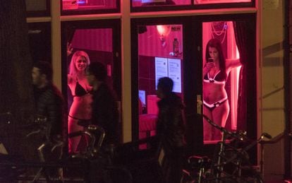 Sex workers in Amsterdam's red light district.