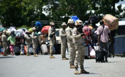 Soldiers guard the border between the Dominican Republic and Haiti on Sept. 14, 2023.