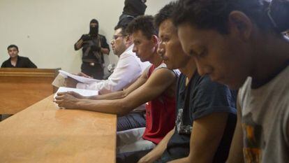 Three men arrested for their alleged participation in the massacre.