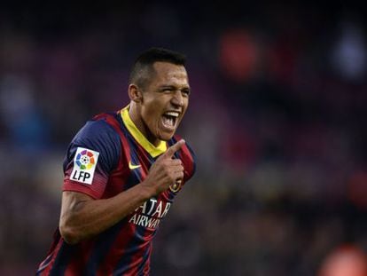 Barcelona&#039;s Alexis celebrates one of his three goals against Elche. 