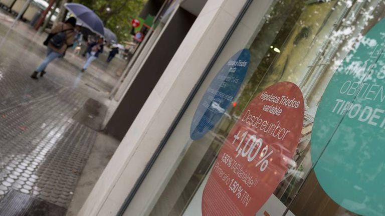 Mortgage advertisement in bank window.