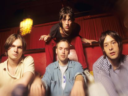 The band The Verve (guitarist Nick McCabe, drummer Peter Salisbury, vocalist Richard Ashcroft, standing, and bassist Simon Jones), during summer 1996 in New York.