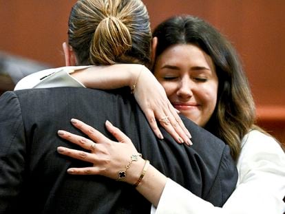 Johnny Depp hugs his lawyer Camille Vasquez after she cross-examined Amber Heard.