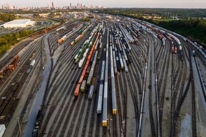 Freight train cars sit in a Norfolk Southern rail yard on Sept. 14, 2022, in Atlanta