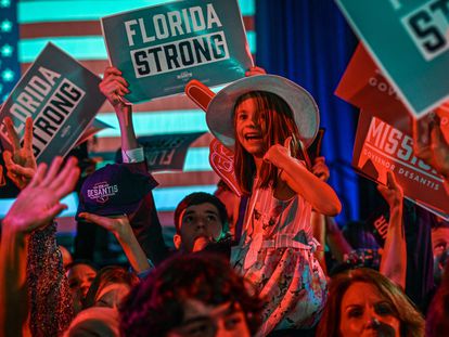Supporters of Republican gubernatorial candidate for Florida Ron DeSantis cheer during an election night watch party.