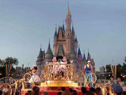 Mickey and Minnie Mouse perform during a parade at the Magic Kingdom theme park at Walt Disney World in Lake Buena Vista, Florida, in 2020.