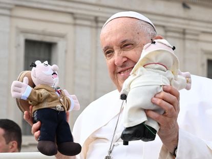 Pope Francis holds gifts at the end of the weekly general audience in St. Peter's Square at the Vatican, October 25, 2023.