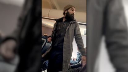 Man accused of trying to open jet’s door and attacking crew during a flight from Los Angeles to Boston.