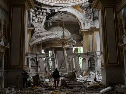 Church personnel inspect damages inside the Odesa Transfiguration Cathedral in Odesa, Ukraine, Sunday, July 23, 2023