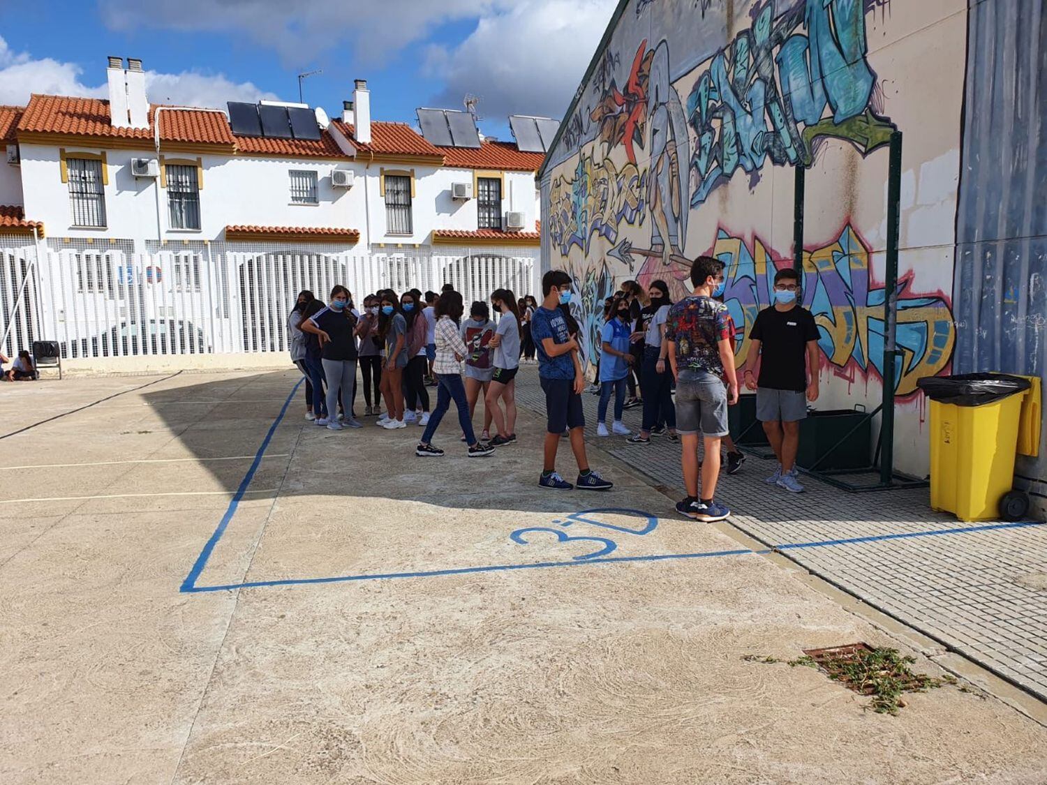 Secondary school students standing within their designated area in Aljaraque, in Huelva province.