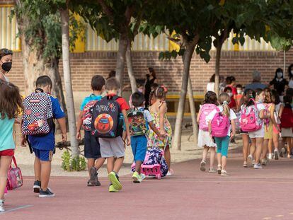 Children returning to school after the summer break in Murcia last week.