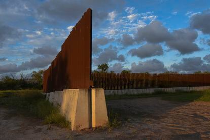 Dusk begins to fall at a section of border fence in Brownsville, Texas, on Wednesday, Nov. 8, 2023