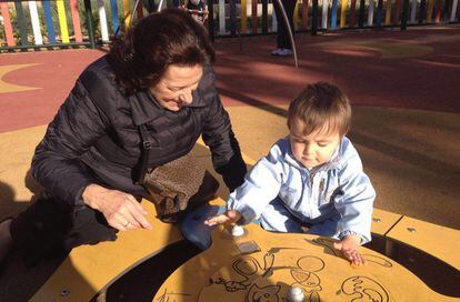 Erundina Baamonde with her two-year-old grandson, Martín.