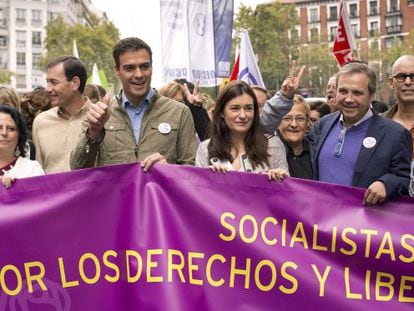 Socialist leader Pedro Sánchez (third from left) marches in Madrid to celebrate the end of the abortion reform.
