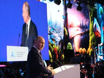 Russian President Vladimir Putin speaks during the plenary session of the international artificial intelligence conference AI Journey 2023 at the World Trade Centre in Moscow, Russia, 24 November 2024.