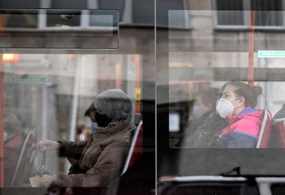 Passengers wearing face masks on a bus in the Spanish city of Burgos.