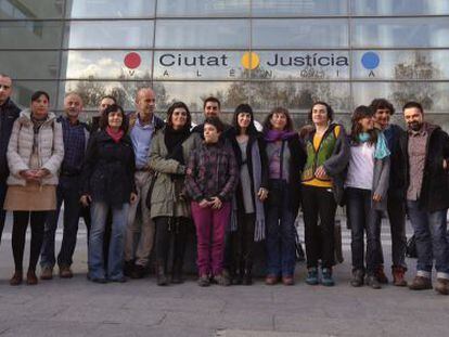 The Greenpeace activists on their first day of the trial, on December 4.