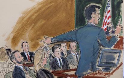 Assistant US Attorney Victor Zapana gives his opening statement while pointing to Hernan Lopez far left in red tie, in Brooklyn federal court, Tuesday, Jan. 17, 2023, in New York.