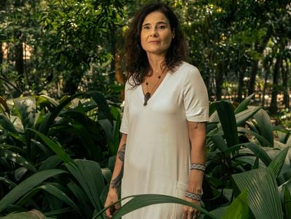 Eliane Brum poses in a São Paulo park, where she lived until moving to Altamira, the epicenter of the Amazonian rainforest’s deforestation.
