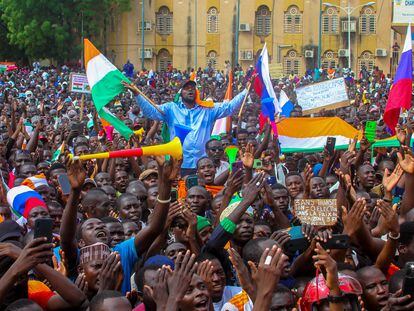 Thousands of anti-sanctions protestors holding Nigerien flags and Russian flags gather in support of the putschist soldiers in the capital Niamey, Niger, on August 20, 2023.