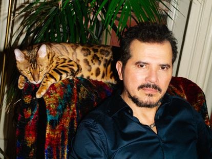 John Leguizamo poses alongside Leo, his Bengal cat, at his home in New York.