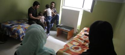 Syrian refugees staying at a Madrid hotel, but hoping to move on to Germany.