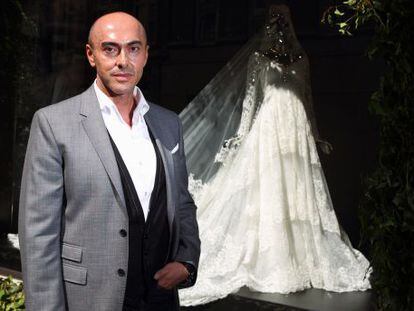 Designer Manuel Mota attends the launch of a collection of wedding dresses inspired by Catherine Middleton at Pronovias boutique on April 27, 2011 in London.