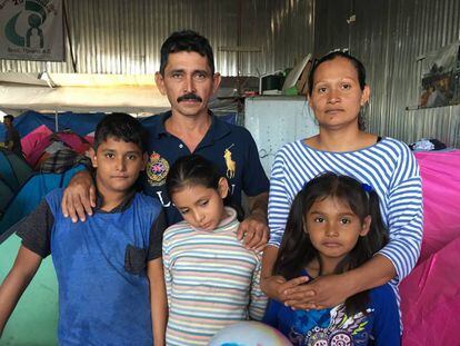 Rafael Castillo, Georgina Ayala and their children in a shelter in Tijuana.