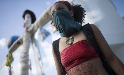 A protestor defending sexual liberties and right to an abortion demonstrates during the recent papel visit in Rio de Janeiro.