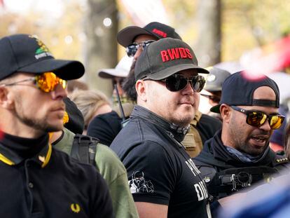 People identifying themselves as members of the Proud Boys join supporters of President Donald Trump for pro-Trump marches, Nov. 14, 2020, in Washington.