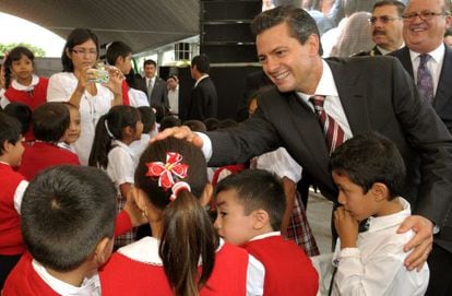 A photograph provided by the Mexican Presidency shows Enrique Pe&ntilde;a Nieto greeting a group pf schoolchildren earlier this month. 