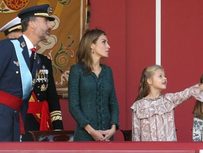 King Felipe, Queen Letizia, the Princess of Asturias and the &lsquo;infanta&rsquo; Sof&iacute;a during a military parade in October.  