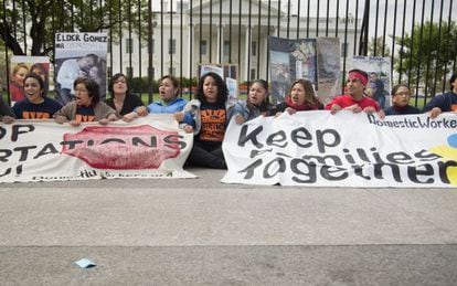 Demonstrators hold a protest in front of the White House against the deportations.