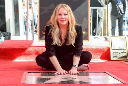 Actress Christina Applegate poses with her star on the Hollywood Walk of Fame on November 14, 2022.