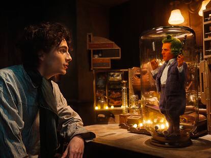 This image released by Warner Bros. Pictures shows Timothee Chalamet, left, and Hugh Grant in a scene from 'Wonka.'