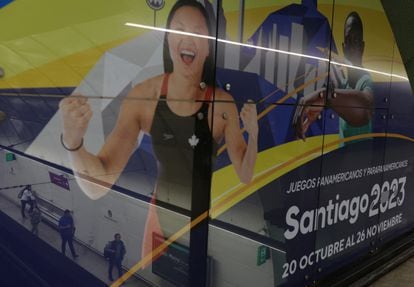 People stand at the subway station prior to the Santiago 2023 Pan American Games, in Santiago, Chile