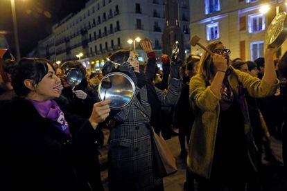 Women protesting in Madrid's Puerta del Sol on Thursday night, ahead of demonstrations planned for Friday.