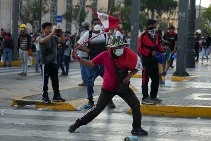 Anti-government protesters clashed with police in Lima on Tuesday.
