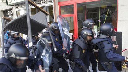 Police battle with demonstrators on Tuesday in Santiago de Compostela.
