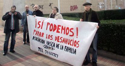Members of the Basque Family Association hold a protest where the woman died in Barakaldo Friday.