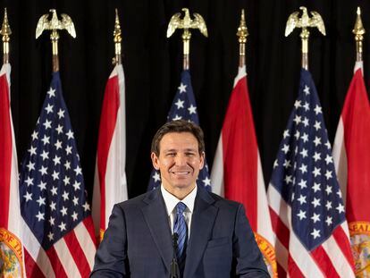 Florida Governor Ron DeSantis answers questions from the media during a press conference at Christopher Columbus High School on March 27, 2023, in Miami.