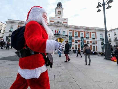 A man dressed as Santa in Madrid’s Puerta del Sol.