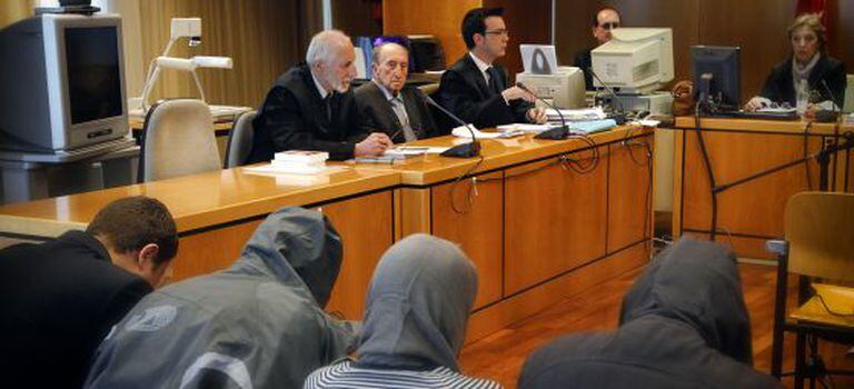 The four defendants during trial for the 2009 assault of a homeless man.