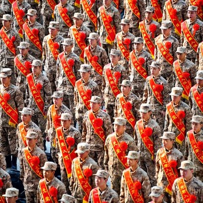 New recruits of Chinese People's Liberation Army (PLA) attend a send-off ceremony at a railway station in Ganzhou, Jiangxi province, China March 16, 2023. China Daily via REUTERS ATTENTION EDITORS - THIS PICTURE WAS PROVIDED BY A THIRD PARTY. CHINA OUT. NO COMMERCIAL OR EDITORIAL SALES IN CHINA.