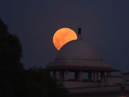 The Moon seen from India Gate, on May 26, 2021, in New Delhi, India.